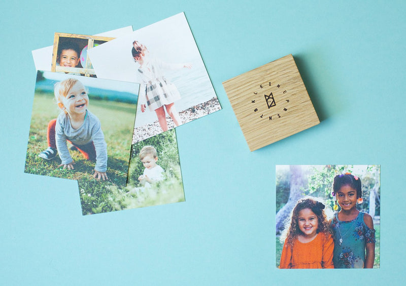 Square photo prints in wooden holder from Kleine Prints
